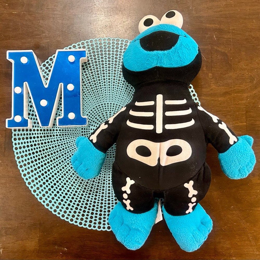 18" Sesame Street Cookie Monster Plush Wearing a Halloween Skeleton Costume